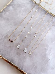 BRAND NEW! Gorgeous CZ crystal necklace. 14k Gold or Rhodium Plating. Brass Base Metal. Adjustable to 15.5 or 17.5 inches. Ready to Ship - ships in 1 to 3 business days Elegant Everyday Teardrop Pendant Jewelry, Chic Drop Wedding Jewelry, Elegant Teardrop Everyday Necklaces, Elegant Everyday Teardrop Necklaces, Minimalist Wedding Necklace With Ethical Gemstones, Chic Wedding Pendant Necklaces, Chic Wedding Pendant Necklace, Dainty Necklaces For Everyday Elegance, Feminine Everyday Pendant Necklaces