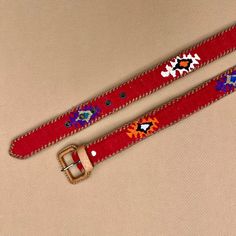 Red Guatemalan Belt - Color Variations Artisan Handmade Leather Belt, Multicolor Embroidered Leather Belt, Handmade Artisan Leather Belt, Traditional Brown Belt For Festivals, Traditional Adjustable Leather Belt, Handmade Leather Bohemian Belts, Handmade Bohemian Leather Belts, Adjustable Folk Style Belts For Festivals, Traditional Leather Belts For Festivals