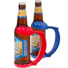 two beer mugs sitting next to each other with lids on them and one holding a bottle opener