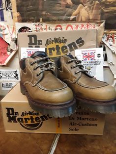 This is an older style of Dr MARTENS.  These are truly vintage in every sense.  Made in England in the 1990s,  this is of the highest quality.  The boot is finished in a very strong aztec brown leather.  This upper is durable and weatherproof too. They are a  hole boot with a padded collar for extra comfort around the ankle. They also have the much stronger bex commando sole. Almost platform like. They are a Uk size 4, European 37, ladies USA 6 Rugged Low-top Boots For Streetwear, Rugged Low-top Streetwear Boots, Casual Closed Toe Work Boots For Streetwear, Vintage Steel Toe Work Boots, Urban Brown Round Toe Boots, Vintage Lace-up Work Boots With Rubber Sole, Urban Brown Boots With Round Toe, Brown Urban Boots With Round Toe, Vintage Boots With Vibram Sole