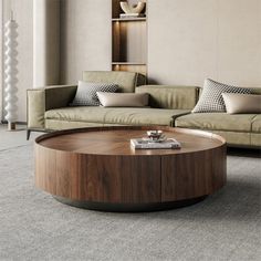 a living room with two couches and a round coffee table in the middle of it