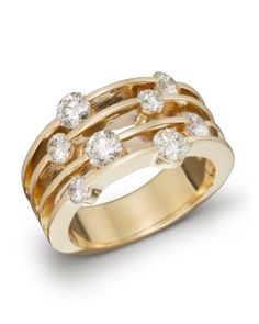 This contemporary yellow gold ring splits into four bands accented with vibrant diamonds. Wide Band Diamond Rings, Crossover Diamond Ring, Diamond Rings Design, Rhinestone Ring, Custom Ring Designs, Popular Jewelry, Exclusive Jewelry, Diamond Band, Rose Gold Engagement Ring