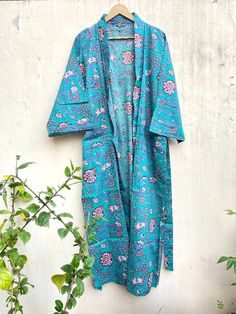 This Robe we makes from 100% Cotton printed fabric. The fabric print is Anokhi Floral which is very popular in all over the world . We use pure cotton cambric fabric . This is free One size robe . There is both side pocket in robe. Length = 120 cms. ( 48 inches) Blue Summer Sleepwear For Home, Blue Printed Cotton Sleepwear, Green Summer Sleepwear For Home, Blue Floral Print Sleepwear For Home, Light Blue Summer Sleepwear For Home, Summer Floral Print Sleep Kimono, Summer Floral Print Kimono For Sleep, Multicolor Cotton Sleepwear For Vacation, Long Sleeve Summer Bedtime Robe