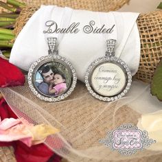 two necklaces that have pictures on them