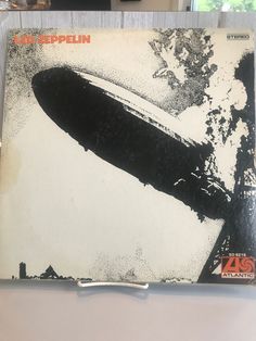 an old record with the cover art for led zeppelin's album, in black and white