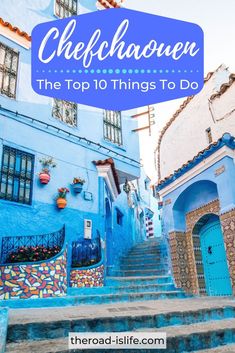 the stairs lead up to some blue buildings