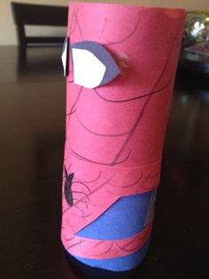 a toilet paper roll with spiderman on it