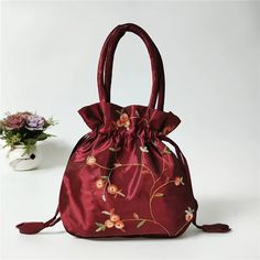 Place Of Origin : HE BEI  Province Place Of Origin : ZHE JIANG Province Occasion : Versatile Exterior : NONE Interior : No Pocket Hardness : SOFT Closure Type : string Pattern Type : Floral Gender : WOMEN Style : Casual Decoration : Embroidery Lining Material : Polyester Main Material : SATIN Shape : Knucklebox Brand Name : macroupta CN : Hebei Type 1 : Women Flower Handbags Type 2 : Jewerly Packing Bag Type 3 : Hanfu Drawstrings Bags Type 4 : Mini Purse Wallets Type 5 : Makeup Bags Type 6 : Out Handbags Storage, Small Pouch Bag, Hanfu Women, Jewerly Bag, Retro Embroidery, Handbag Storage, Flower Handbag, Bag Flower, Women Purse