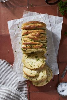 bread is stacked on top of each other and ready to be sliced into small pieces