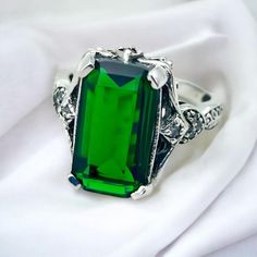 Vintage Vivid Green Simulated Emerald With Cz Accent Stones In 925 Solid Sterling Silver Ring. Stamped 925. Excellent Condition, Satisfaction Guaranteed! Classic Green Crystal Ring In Sterling Silver, Elegant Silver Crystal Ring With Birthstone, Elegant Green Crystal Ring For Formal Occasions, Elegant Silver Crystal Birthstone Ring, Classic Silver Emerald Ring With Accent Stones, Luxury Silver Emerald Ring Gift, Sterling Silver Emerald Ring With Diamond Accents As Gift, Silver Emerald Crystal Ring With Accent Stones, Gift Emerald Ring With Diamond Accents In Sterling Silver