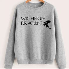 Mother Of Dragons Got Game Of Thrones Graphic Crewneck Sweatshirt Long Sleeves Pullover Style Pill Resistant Machine Washable Double Needle Stitching Ribbed Wrists & Waistband Available In Unisex Sizes S-3x Warm 50/50 Cotton & Polyester Blend *Each Hoodie, Sweatshirt Or T-Shirt Is Custom Made And Made To Order. *Add To Bundle Or Comment If You Would Like A Different Color Or A Custom Design On The Back. *Ask Any Questions Prior To Ordering *Offers Welcome* *If You’re New To Poshmark, Get $10 Off Gray Crew Neck Sweater With Logo Print, Heather Grey Long Sleeve Tops With Logo Print, Heather Grey Long Sleeve Top With Logo Print, Gray Letter Print Crew Neck Sweater, Gray Crew Neck Sweater With Letter Print, Dragons Game Of Thrones, Notre Dame Sweatshirt, Got Game Of Thrones, Faux Fur Hoodie