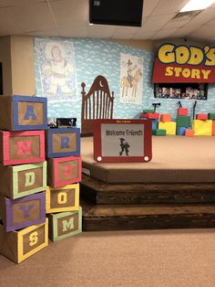 the children's room is decorated with blocks that spell out welcome friends and names