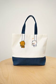 Milk Mocha Bear - Hanging Out Canvas Tote Bag [16x12.5 Inches 8 Inches Tall] NEW ITEM DESCRIPTION SHOPVILLE Commitment FAST FREE Shipping SAFE & SECURE Payments 30 DAY Return Policy VISIT Our Store The Shopville Commitment 100% Customer Satisfaction Buy from us with confidence. With years of experience and thousands of orders fulfilled, we maintain our commitment to deliver top service. Our reputation for service should speak for itself. Rest assured, we are committed to 100% customer satisfacti Milk Mocha Bear, Tote Bag Accessories, Milk And Mocha, Painted Canvas Bags, Milk Mocha, Mocha Bear, Milk & Mocha, Painted Tote, Stylish Tote Bag