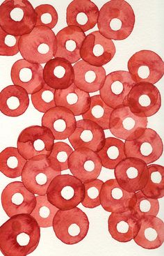 an image of red circles on white paper