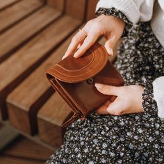 The Connie small leather wallet is perfect for carrying in your crossbody bag or clutch. Small but deceptively spacious, there's plenty of room for numerous cards, receipts, and coins. This simple mini wallet is finished with a scoop overstitch detail to the front. Inside you'll find 6 card slots, 2 slots for receipts and notes, and a central zipped coin compartment. The wallet closes with a popper fastening and is fully lined in our floral print fabric and finished with brass hardware. Handmade Womens Leather Wallet, Leather Sketchbook, Leather Passport Wallet, Small Leather Purse, Tan Purse, Small Leather Wallet, Leather Store, Fur Leather Jacket, Leather Formal Shoes