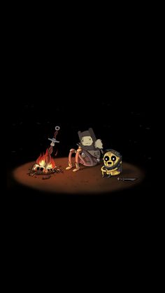 two people sitting around a campfire in the dark with one person holding a knife