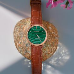 Malachite watch,Anniversary gift,Mens watch,Watches for women,Watch for her,Ladies watch,Luxury watch,Stone watch,Healing,Energy,Balance Brand: ZENGORI SERIES: Galaxy Band Material: Leather Watch Movement: Quartz Dial Material: Genuine Malachite Case Material: 18k Rose Gold CASE SIZE: 36/40 mm WATCH LABEL: Swiss Made/Sapphire Case: Thickness Water-resistant depth: 30 meters / 100 feet Department: Unisex Dial window material type: Enjoy the precise time as you wish, the sapphire crystal makes the Gift Watches With Diamond Hour Markers And Round Dial, Watch Accessories With Diamond Hour Markers For Gifts, Elegant Green Watch As A Gift, Elegant Green Watch For Gift, Green Watch With Metal Dial As Gift, Green Watch With Metal Dial For Gift, Modern Green Watches For Gift, Analog Jewelry And Watches With Round Dial For Gifts, Modern Analog Jewelry And Watches For Gift