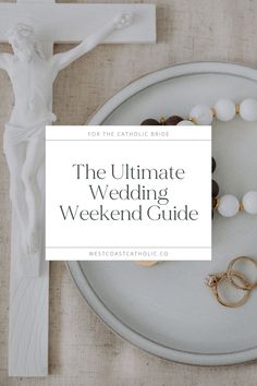 the ultimate wedding weekend guide for the catholic bride, with rings and bracelets on a plate