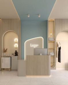 the interior of a clothing store with white and blue walls, flooring and lighting