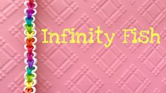 the word infinity fish is written on a pink background with rainbow - colored braids