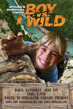 a boy is smiling and posing for the camera in front of a sign that says boy wild