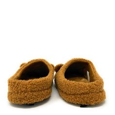 Be un-bear-ably adorable with these super soft women's novelty slip-on slippers from Oooh Geez! Slippers. Stay warm & look great with your new teddy bear themed tan fuzzy slippers. Wear them around the house or out and about thanks to the non-skid rubber bottom. Pick up a pair today! Material: Inside 100% Sherpa, Outside 100% Acrylic Style: Sherpa slipper with non-skid rubber bottom sole Care: Machine wash cold with no bleach and hang to dry Size:Small fits women's U.S. shoe size 5 - 6Medium fit