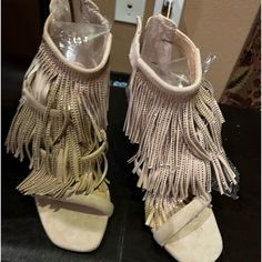 Very Cute Suede Fringed Booties With Gold Stones As Tasteful Bling Detail. Back Zipper Closure. 3 Layers Of Fringe. 4” Heel. Never Worn Excellent Condition Beige Suede Party Boots, Spring Party Booties With Block Heel, Suede Ankle Boot Booties For Party, Suede Ankle Booties For Party, Spring High Heel Shoes With Tassels, Chic High Heel Tassel Heels, Leather Tassel Heels For Party, Party Leather Heels With Tassels, Spring High Heels With Tassels