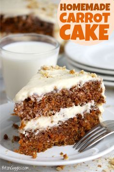 a piece of carrot cake on a white plate with a fork and glass of milk