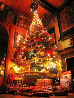 a decorated christmas tree in a living room