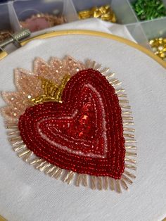 a close up of a heart shaped object on a table