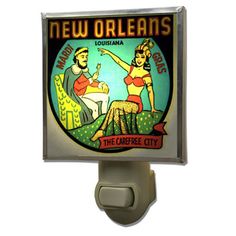 a new orleans sign is mounted on a light fixture in the shape of a bottle opener