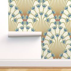 an art deco wallpaper with fan motif in gold and blue on a white background