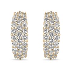 These exquisite diamond cluster earrings radiate brilliance and luxury. Each pair boasts over a carat of high-quality diamonds, ranging from VVS2 to VS1 clarity and F-H color, expertly pave-set within the fine 18K yellow gold setting. With the added comfort and security of omega backs, these earrings are a timeless and glamorous addition to any jewelry collection. Setting Style: Pave Setting Material: 18K Yellow Gold Setting Weight: 10.6 Grams Main Stone: Diamond Approx Weight: 2.10-Carats (Total) Cut: Brilliant Round Clarity: VVS2-VS1 Color: F-H Luster: Excellent Treatments: Natural Estimated Retail Value: $22,490.00 USD Keep in mind we custom create all of the items listed here. If you have a special request for a custom-created item please contact us at 1 800 840 6828. Complimentary shi Diamond Cluster Earrings, Tiny Bow, Set Earrings, Earrings Diamond, Yellow Gold Setting, Pave Setting, Emerald Earrings, Emerald Jewelry, Cluster Earrings