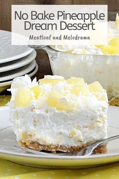 no bake pineapple dream dessert is shown on a plate with a fork next to it