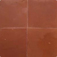 a brown tile floor with four squares in the middle and one square at the top