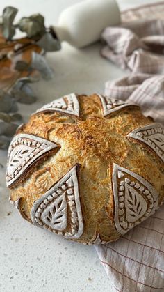 a loaf of bread sitting on top of a cloth