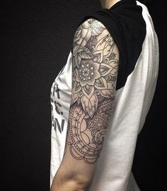 a person with a tattoo on their arm