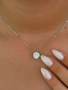 This Beautiful timeless floating prong set diamond pendant is set with 1-carat lab-grown diamond in 14k solid gold. It will be the classic perfect gift for any woman in your life--whether she's your wife, girlfriend, fiancée, or bride. The pendant and chain are made of 14k solid gold and feature a spring clasp. The necklace is available for purchase with or without an IGI certificate. All of our diamonds are high-quality D color, VS1 clarity. Each diamond is securely set in a Prong setting, radiating sophistication with every glance. Every diamond is expertly positioned to reflect maximum light and brilliance that tells your forever love story. Item Details: 14k solid gold pendant and chain Chain length: 16 inches up to 18 inch Diamond: CVD lab-grown diamonds  Total Weight: 1 carats Cut: R Diamond Carat Size, Solitaire Necklace, Solid Gold Necklace, Diamond Solitaire Necklace, Necklace Diamond, Gold Diamond Necklace, Solitaire Necklaces, 14k Gold Necklace, Lab Created Diamonds