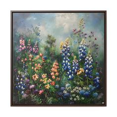 an oil painting of flowers and butterflies in a field with blue sky behind it, framed on