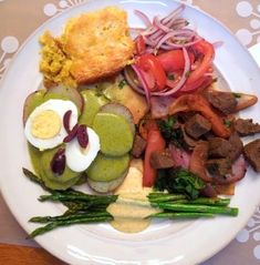 a white plate topped with different types of food