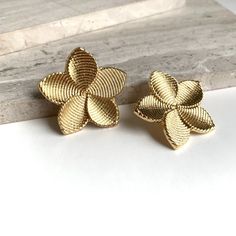 New~ Anthropologie Shashi "Palesa" Flower Earrings Striated Petals Feature A Post Earring And Are A Balance Of Refined Femininity And Industrial Modernity. This Floral Silhouette Makes A Sophisticated Statement. Gold Plated Metal, Post Backs Included. Approx. Size: 1-1/4"L, 1-1/4"W. Nwot. Anthro Style, Boho Style, Trendy, Brand New Anthropologie Jewelry, Everyday Earrings, Golden Flower, Shiny Gold, Metallic, Bridal, Wedding, Hoop, Shashi For Anthropologie, Delicate, Dainty, Classic, Gold Tone F Gold Clip-on Earrings For Spring Gift, Gold Flower Earrings With Handmade Details, Gold Flower Clip-on Earrings For Spring, Gold Earrings With 3d Flowers For Spring, Handmade Flower Gold Earrings For Gift, Spring Gold Jewelry With Handmade Flowers, Handmade Flower Shaped Gold Jewelry, Gold Flower Earrings With Handmade Flowers, Gold Earrings With Handmade Flowers For Gift