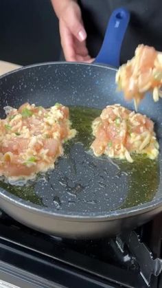 someone is cooking food in a pan on the stove