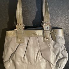 New With Tags. Coach. Gray With Pink Lining Inside. Adjustable Buckle Straps. Shoulder Bag. Very Spacious With Many Pockets Of Different Sizes. Silver Coach Shoulder Bag With Handles, Coach Silver Shoulder Bag With Branded Hardware, Pink Coach Purses, Beige Purses, Grey Shoulder Bag, Leather Satchel Handbags, Medium Handbags, Brown Shoulder Bag, Coach Shoulder Bag