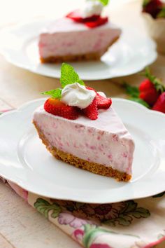 a slice of cheesecake with strawberries on top