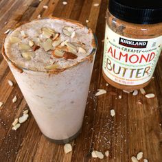 almond milkshake next to jar of almond butter