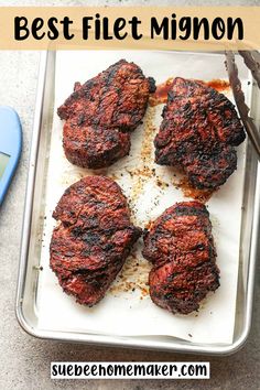 four steaks on a tray with the words best filet minon