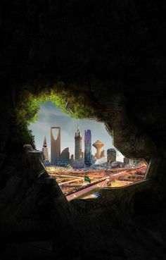 an image of a city through a hole in the ground