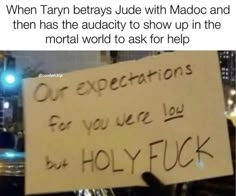 a sign that is on the side of a car saying, when tarry breaks jade with madoc and then has the audactity to show up in the most martial world to ask for help