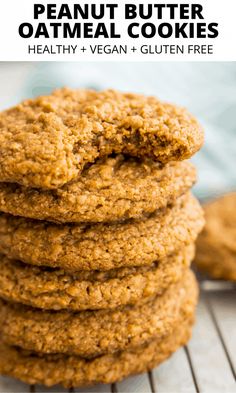 a stack of peanut butter oatmeal cookies on top of a cooling rack