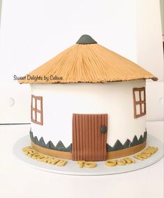 a cake that is shaped like a house